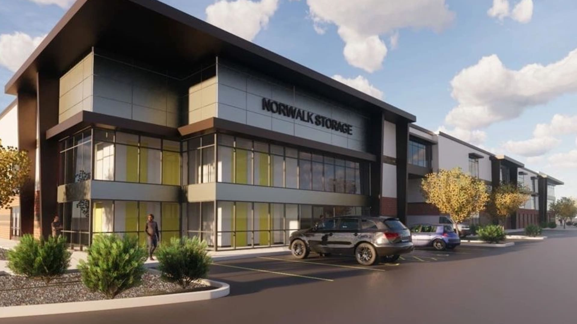A rendering of the exterior of a building with cars parked in front.