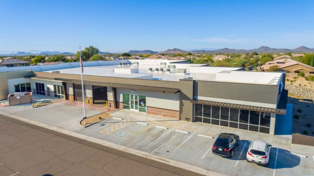Tatum and Dynamite Self Storage Aerial Photo of Exterior Building with Windows and Brick
