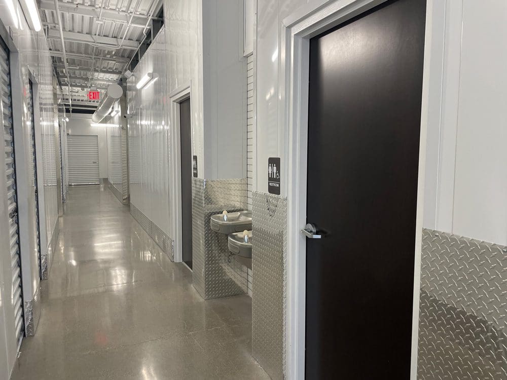 Tatum and Dynamite Self Storage Photo of Hallway with Restrooms and Fountain