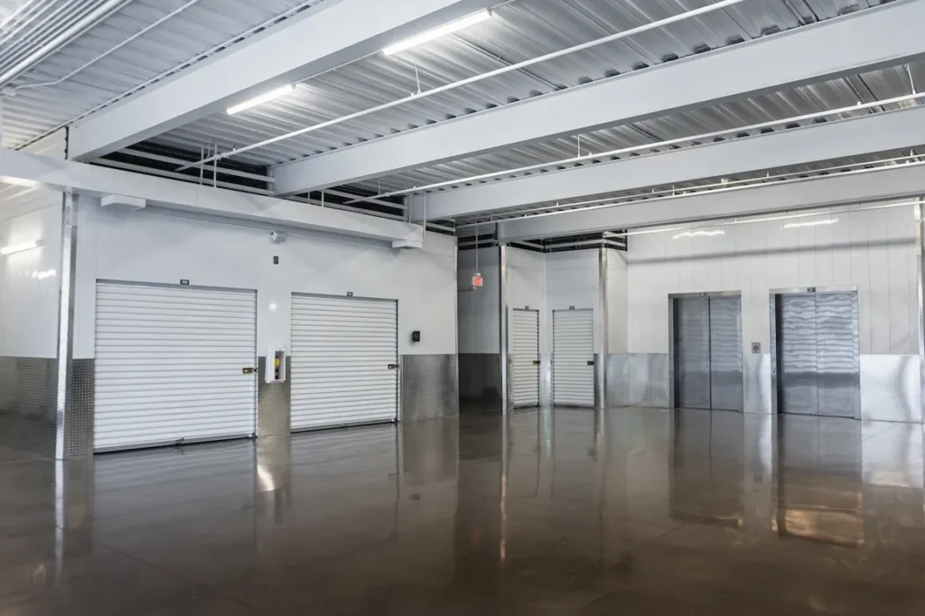 A large room with a lot of windows and doors