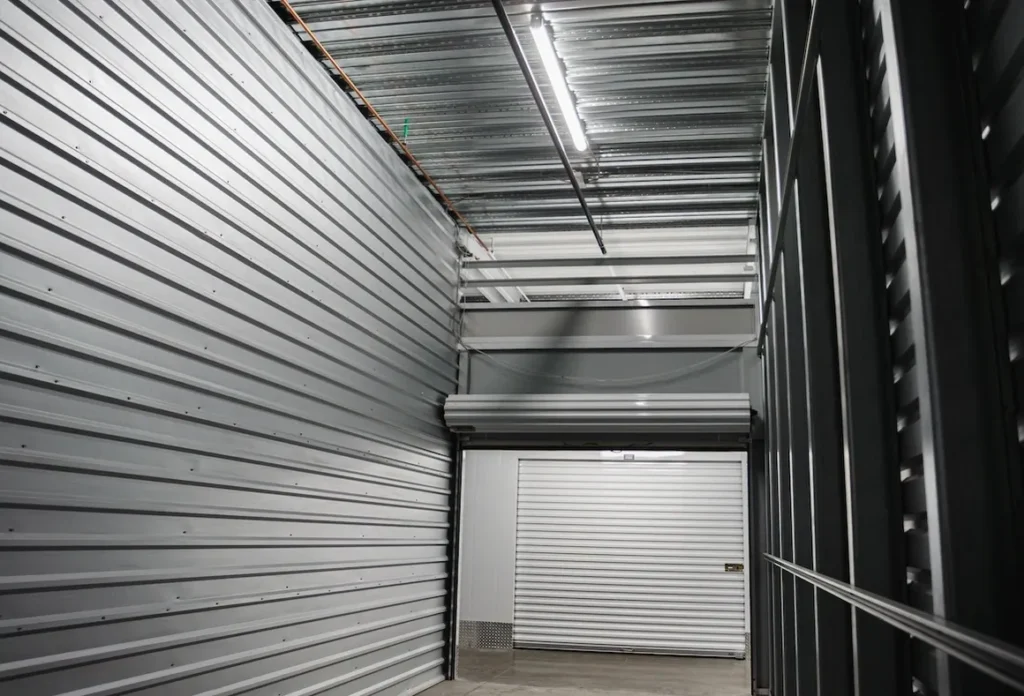 A storage unit with a lot of doors and walls