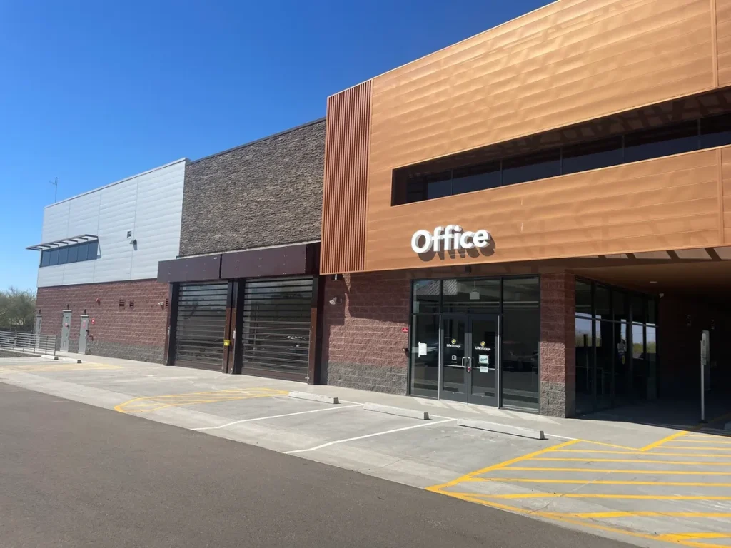 A building with an office sign on the front.