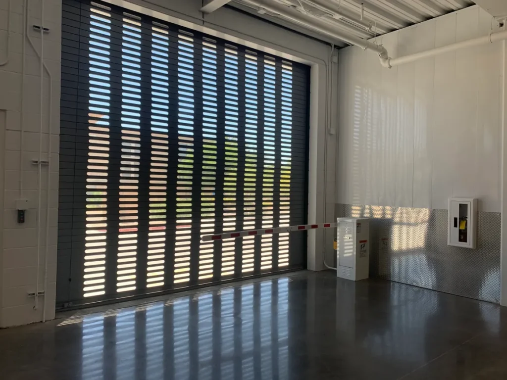 A room with a large window and a table