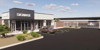 artist rendering of a single level building with fenced area for RV storage