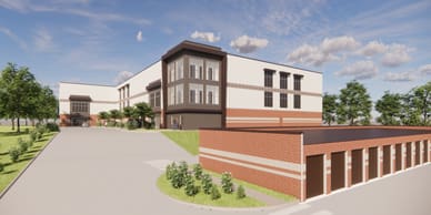 Multi-level building with windows and brick accents