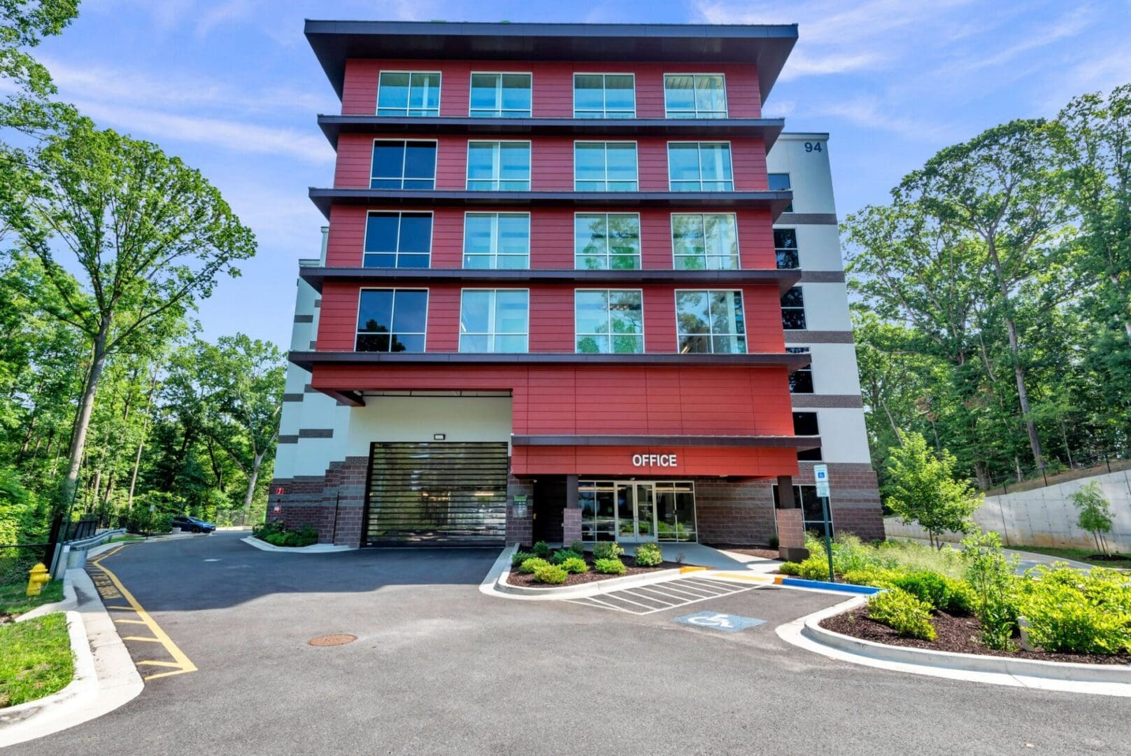 Multi-story storage building with windows and brick accents