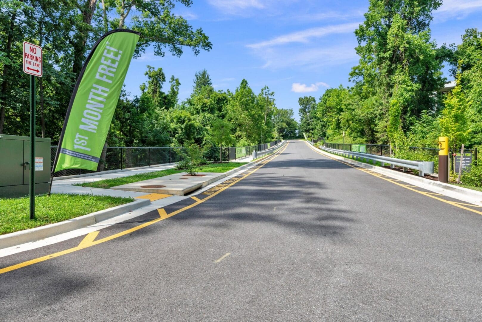 Long driveway leading to a modern storage facility in Annapolis