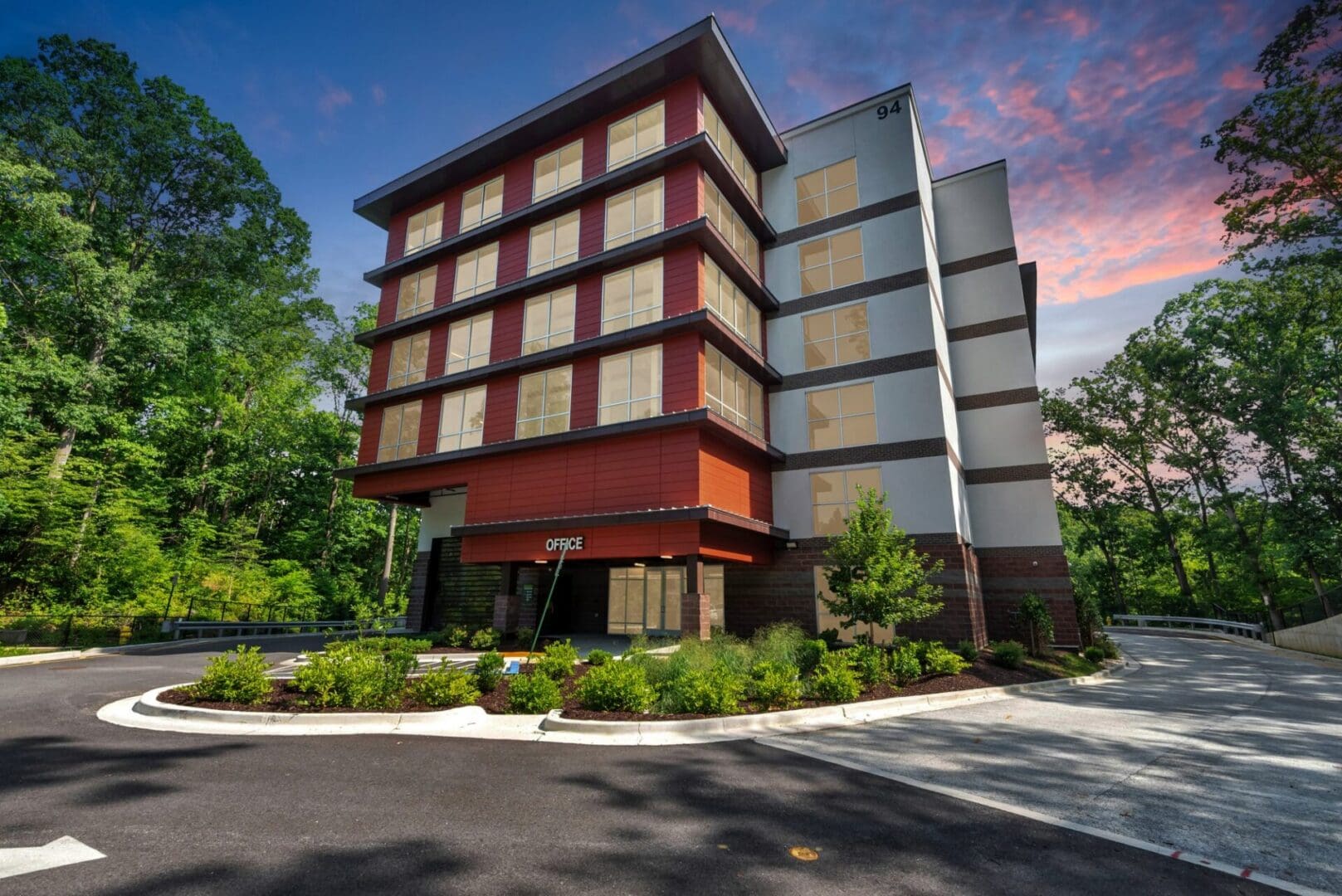 Multi-story storage building with windows and brick accents