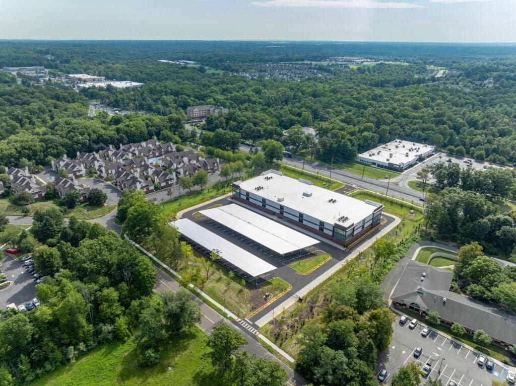 Aerial view of a storage facility and covered parking spaces