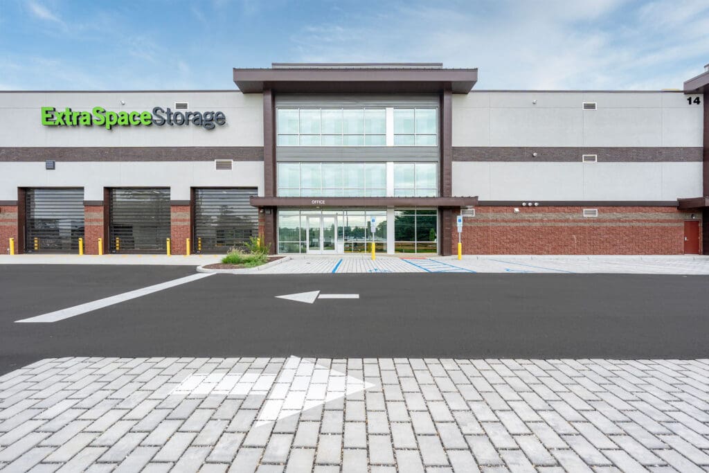 Multi-level storage building with windows to green storage units